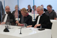 Rob Meijer, lawyer for the Crimean museums waits for the verdict in a Dutch appeals court in Amsterdam, Tuesday Oct. 26, 2021, on ownership of a trove of Crimean historical artifacts that were loaned to an Amsterdam museum shortly before Russia annexed the region. A lower court ruled in 2016 that the treasures should be handed to the Ukrainian government. (AP Photo/Peter Dejong)