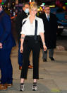 <p>Kristen Stewart wears lace-up heels and an undone black ribbon as she arrives at <i>The Late Show with Stephen Colbert</i> on Jan. 24 in N.Y.C.</p>
