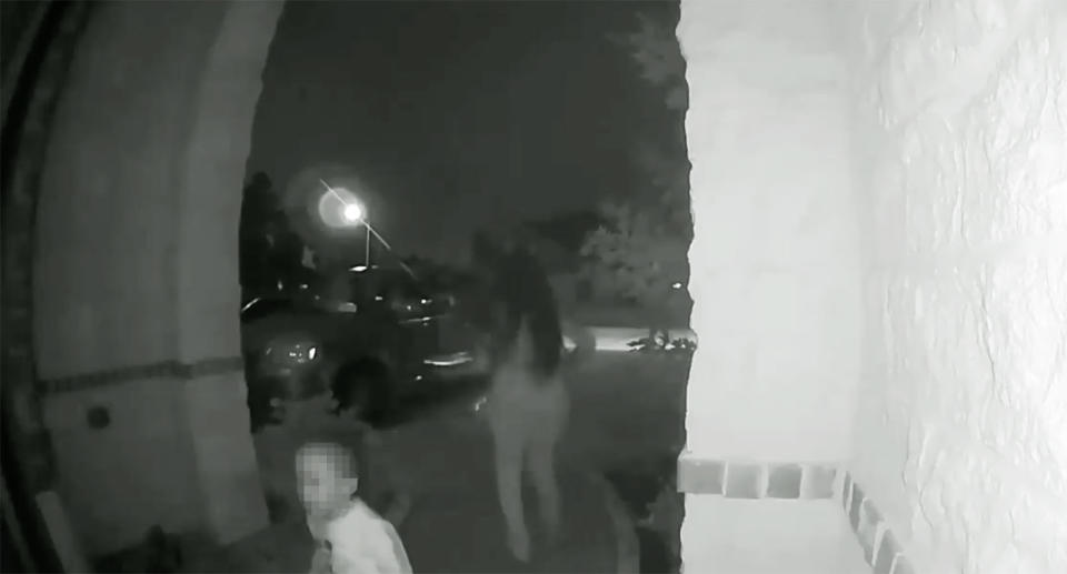 Keairra Woods can be seen on security footage sprinting away from the front door of the Houston home.