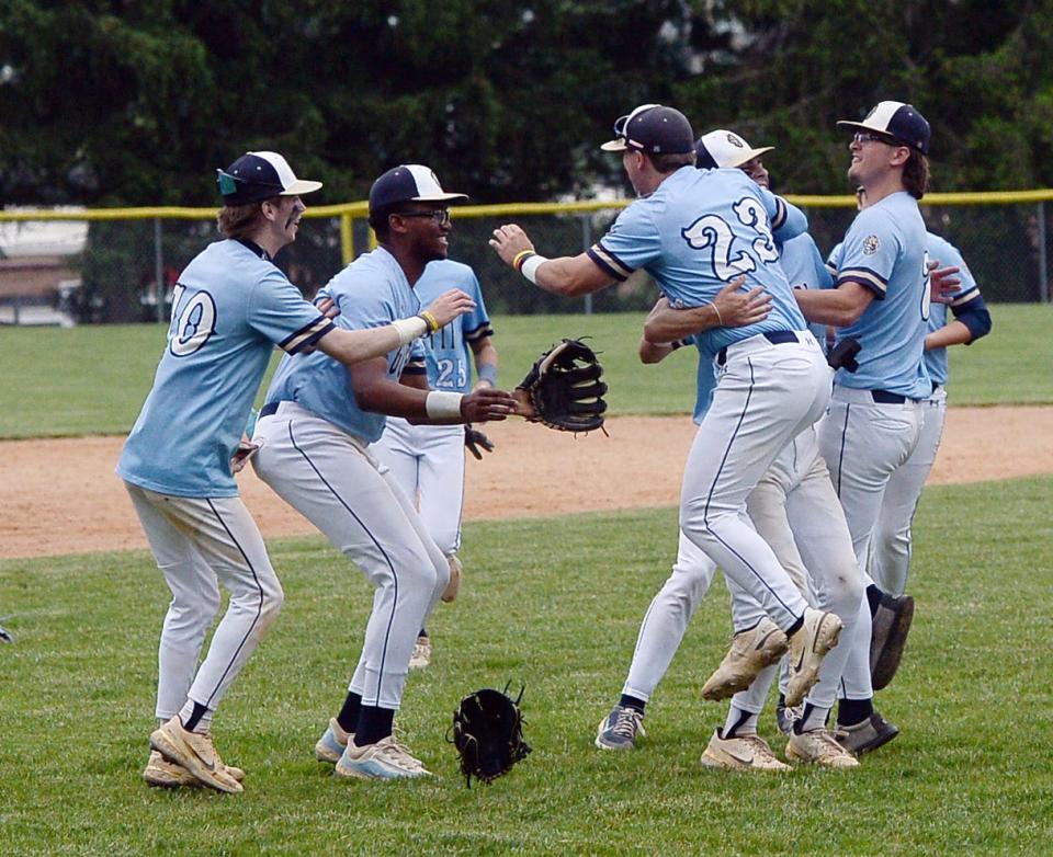 St. Maria Goretti players celebrate after defeating Avalon 6-0 in the Old Line League championship game.