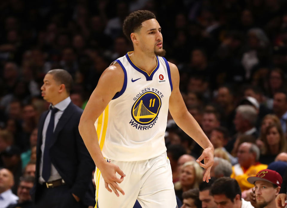 While touring in China, Golden State Warriors guard Klay Thompson stopped to play arcade pop-a-shot with a young Chinese girl. She absolutely destroyed him. (Getty Images)