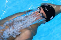 <p>A swimmer from team Japan in action in the Men’s 4x100m medley relay heats at the 2018 Asian Games in Jarkarta, Indonesia. (Reuters) </p>