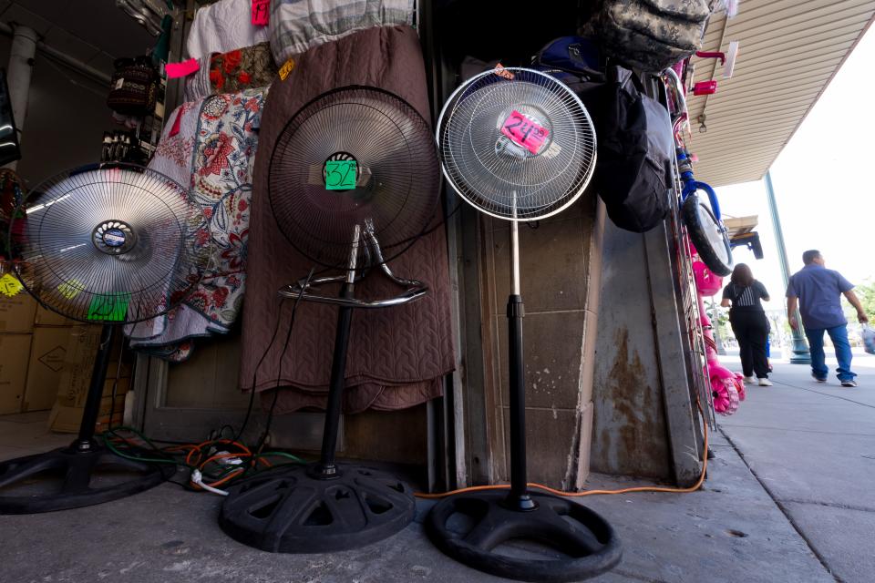 Fans are sold at stores on El Paso Street in Downtown El Paso on Tuesday.