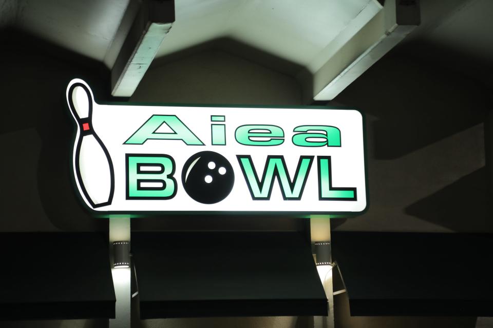 Front Exterior Signage at The Alley Restaurant at Aiea Bowl in Aiea, Hawaii as seen on Discovery Plus' Guy's Hawaii Episode 4.