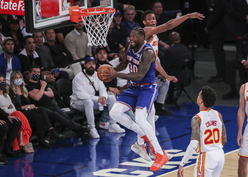  Julius Randle #30 of the the New York Knicks drives to the basket in the third quarter against the Atlanta Hawks during Game Five of the Eastern Conference first round series at Madison Square Garden on June 02, 2021 in New York City. NOTE TO USER: User expressly acknowledges and agrees that, by downloading and or using this photograph, User is consenting to the terms and conditions of the Getty Images License Agreement.  (Photo by Wendell Cruz-Pool/Getty Images)