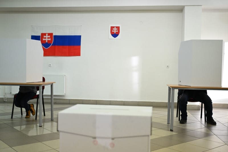 Voters cast their ballots at a polling station in 2024 Slovakia presidential election run-off. Šálek Václav/CTK/dpa