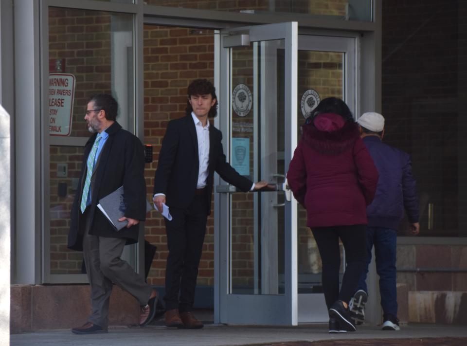 Wallkill Town Councilman Neil Meyer, left, who ran for town supervisor as a Democrat, exits the Orange County Courthouse with Zak Constantine, chair of the Orange County Democratic Party.