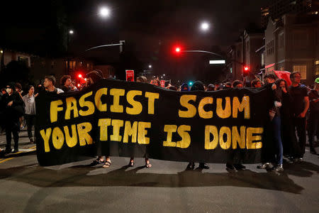 Demonstrators march in response in response to the Charlottesville, Virginia car attack on counter-protesters after the "Unite the Right" rally organised by white nationalists, in Oakland, California, U.S., August 12, 2017. REUTERS/Stephen Lam