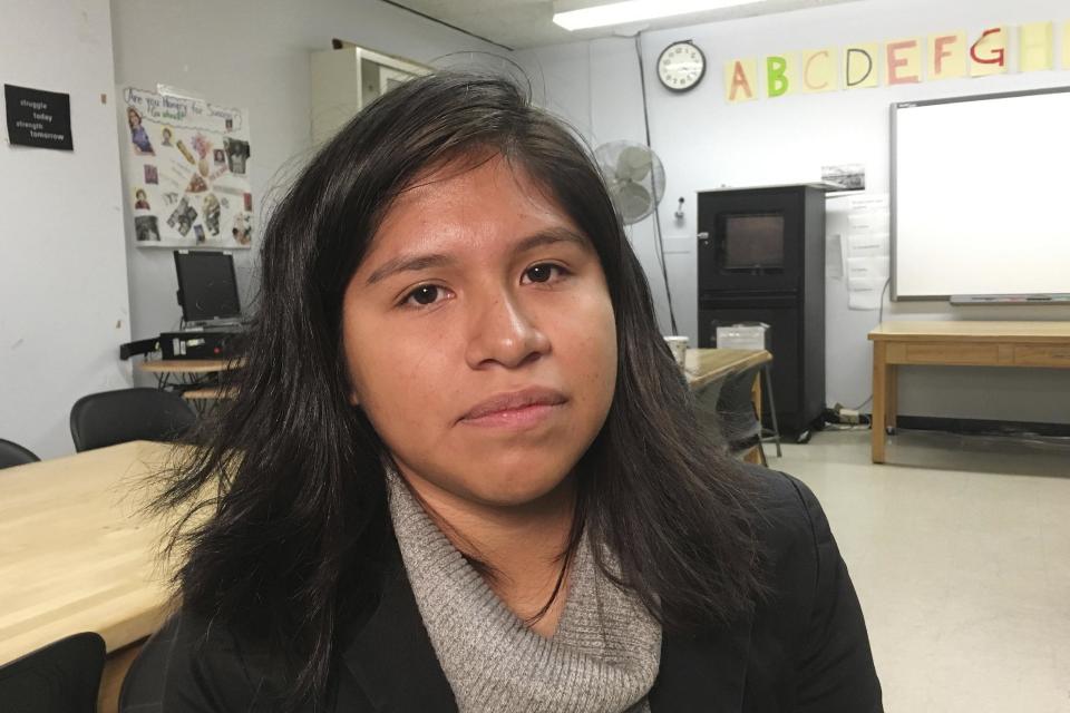 In this photo taken Dec. 1, 2016, Nancy Lopez-Ramirez, 20, from Mexico, discusses her travel plans at City College of New York. Young immigrants who live illegally in the country and are traveling abroad have been advised to return to the U.S. before Donald Trump is sworn in as president on January 20th. (AP Photo/Claudia Torrens)