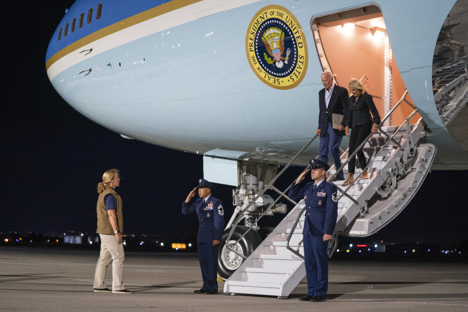 President Joe Biden and first lady Jill Biden arrive at Reno-Tahoe International Airport, Friday, Aug. 18, 2023, in Reno, Nev., for a vacation in the area. (AP Photo/Evan Vucci)