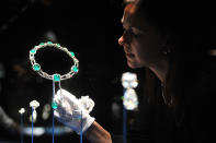 LONDON, ENGLAND - JUNE 28: The emerald and diamond stomacher designed for the Delhi Durbar on display in the Diamonds: A Jubilee Celebration exhibition which forms part of the summer opening of Buckingham Palace on June 28, 2012 in London, England. 10,000 diamonds set in works acquired by six monarchs over three centuries go on display to mark Queen Elizabeth II's 60 year reign. With many items from the Queen's personal collection joining those chosen for their artistic significance and historical importance from the Royal Collection. The exhibition opens on Saturday and runs til 8th July and then again from July 31 to October 7. (Photo by Bethany Clarke/Getty Images)