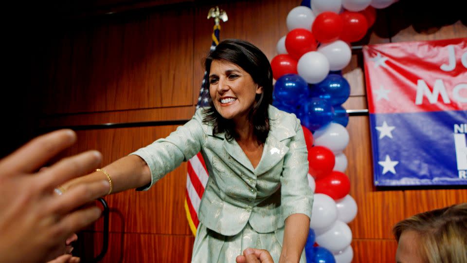 In this November 3, 2010, photo, Haley greets supporters in Columbia, South Carolina, after delivering her victory speech in the governor's race. - David Goldman/AP