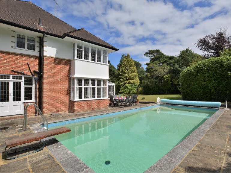 <p>This chic holiday cottage with a pool in Dorset is great for getting away with friends or family and having the option to take a dip in the pool or spend days at the beach. Set in the village of Canford Cliffs, there's loads of room in the homely pad for a group, with a breakfast bar and spacious dining inside and out for socialising. The serene garden is perfect for rolling out your <a href="https://www.womenshealthmag.com/uk/fitness/yoga/g25471397/best-yoga-mats/" rel="nofollow noopener" target="_blank" data-ylk="slk:yoga mats;elm:context_link;itc:0;sec:content-canvas" class="link ">yoga mats</a>, too.</p><p><strong>Sleeps:</strong> 8</p><p><strong>Pets:</strong> No</p><p><strong>Bring:</strong> Aside from your <a href="https://www.womenshealthmag.com/uk/gym-wear/a33560922/youswim-swimwear/" rel="nofollow noopener" target="_blank" data-ylk="slk:swimsuit;elm:context_link;itc:0;sec:content-canvas" class="link ">swimsuit</a> (obvs), you'll want to take your beach kit as Sandbanks' sands are nearby</p><p><strong>Price: </strong>3 nights from £1,280</p><p><strong>Available from: </strong><a href="https://go.redirectingat.com?id=127X1599956&url=https%3A%2F%2Fwww.holidaycottages.co.uk%2Fcottage%2F47267-woodridings&sref=https%3A%2F%2Fwww.womenshealthmag.com%2Fuk%2Ffitness%2Ffitness-holidays%2Fg33559308%2Fcottages-with-pools%2F" rel="nofollow noopener" target="_blank" data-ylk="slk:Holidaycottages.co.uk;elm:context_link;itc:0;sec:content-canvas" class="link ">Holidaycottages.co.uk</a></p>