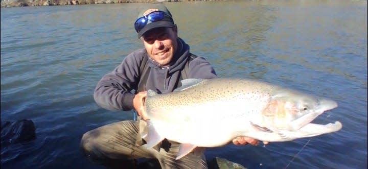 Joshua Giordano of Bangor holds up this rainbow trout measuring 41 inches in length and 27 inches in girth before releasing it back into the Thermalito Diversion Pool on Dec. 7.