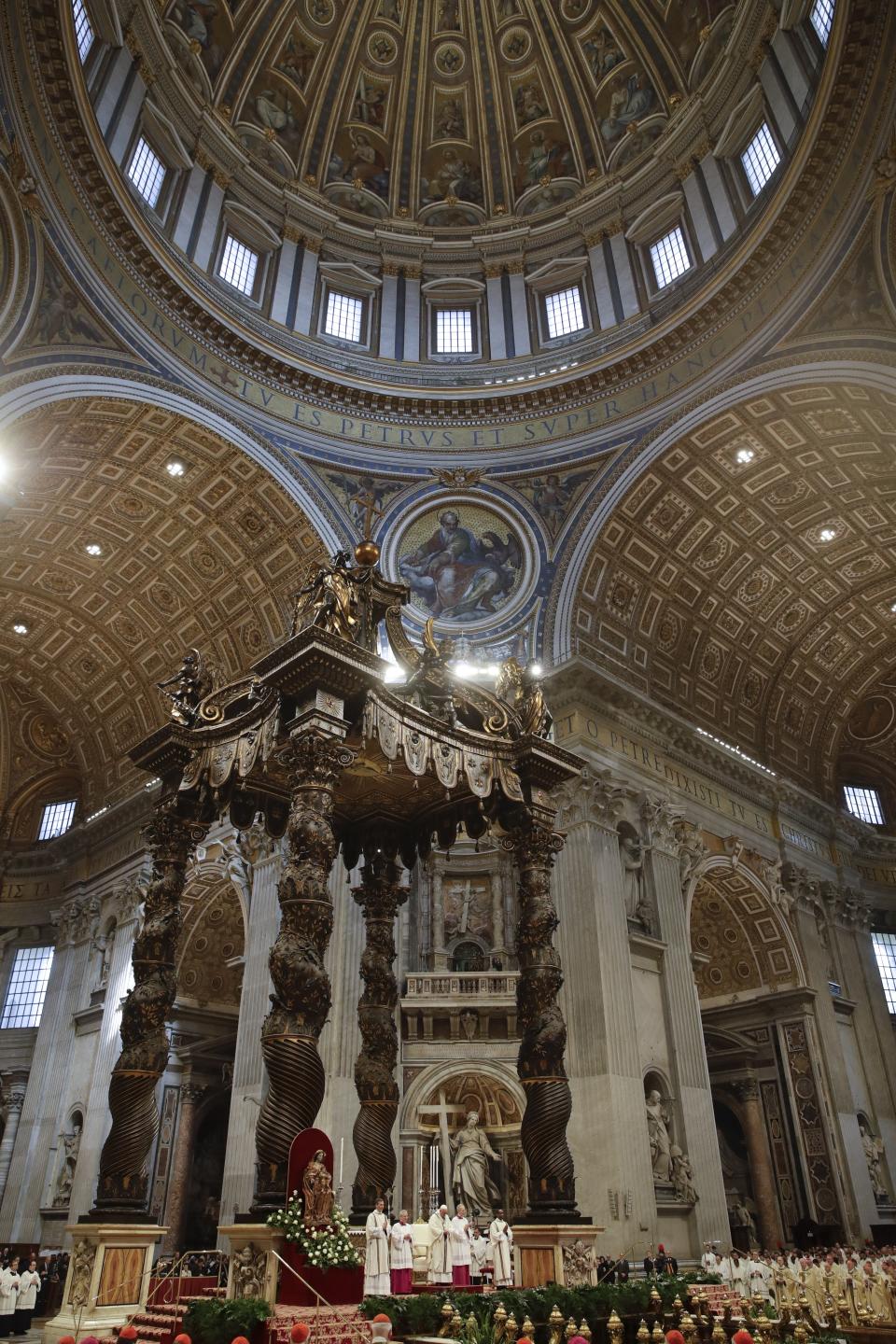 Pope Francis celebrates Chrism Mass, inside St. Peter's Basilica, at the Vatican, Thursday, April 18, 2019. During the Mass the Pontiff blesses a token amount of oil that will be used to administer the sacraments for the year. (AP Photo/Alessandra Tarantino)