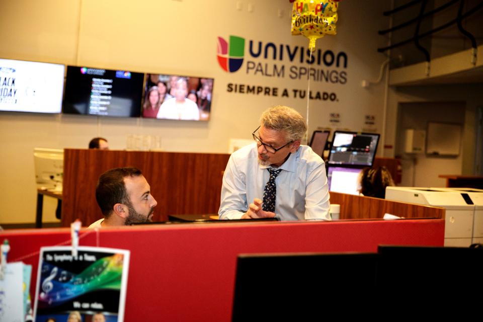 Fred Roggin, right, chats with NBC Palm Springs news anchor Tim O'Brien inside the television newsroom in Palm Desert, Calif., on Nov. 27, 2023. Roggin will be doing a new show for NBC Palm Springs beginning in January.