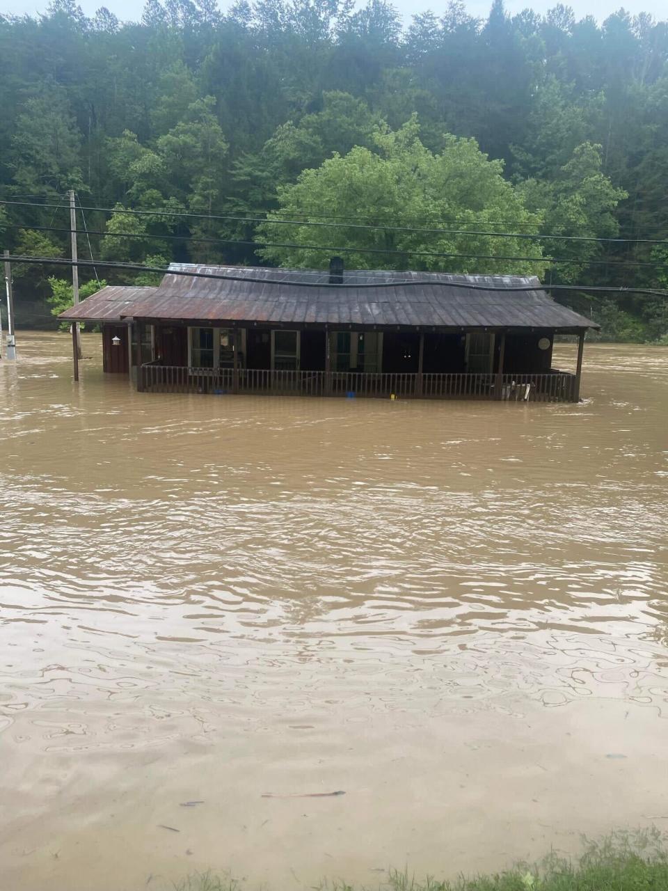 The view of Bolen's grandfather's house during the flood in Knott County, Kentucky, Aug. 2022.<span class="copyright">Shared by Lakyn Bolen</span>