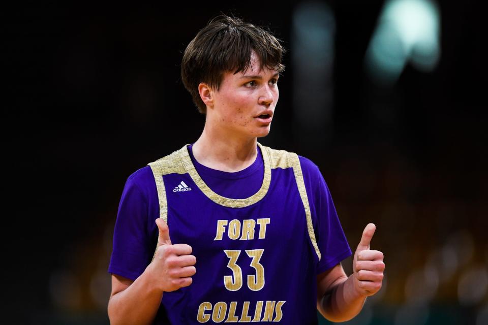Fort Collins' Luke Wagstaff gives thumbs up during a Class 6A state basketball quarterfinal playoff game against Fossil Ridge at the Denver Coliseum on March 4. The SaberCats won 72-58.