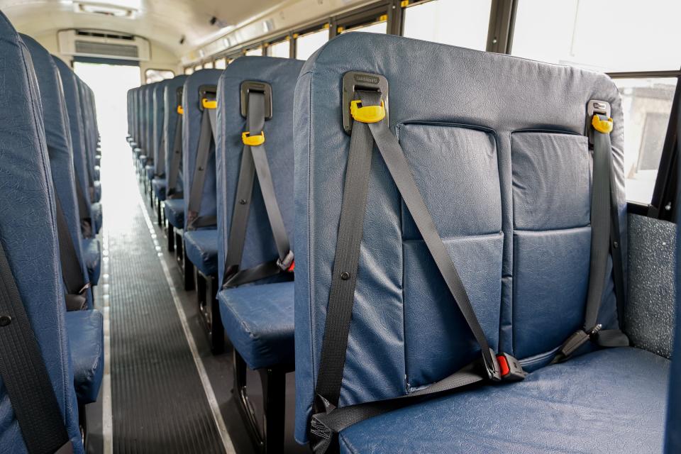 A Hays CISD school bus equipped with 3-point lap and shoulder seat belts is displayed outside a Hays Consolidated Independent School District Board of Trustees meeting at the Historic Buda Elementary Campus on Monday, April 15, 2024 in Buda, Texas.