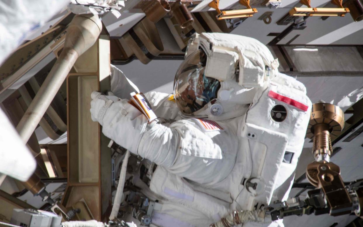 Anne McClain, pictured, is one of the two female astronauts affected by the lack of equipment   - AFP