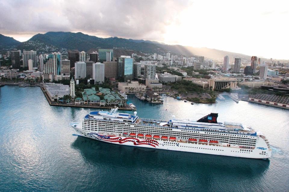 This undated image provided by Norwegian Cruise Line shows an aerial view of the Norwegian ship Pride of America in Honolulu. The ship sails year-round from Honolulu on Oahu to various ports on the Big Island, Maui and Kauai. A cruise is an easy way to see the Hawaiian islands without having to fly between them. (AP Photo/Norwegian Cruise Line)