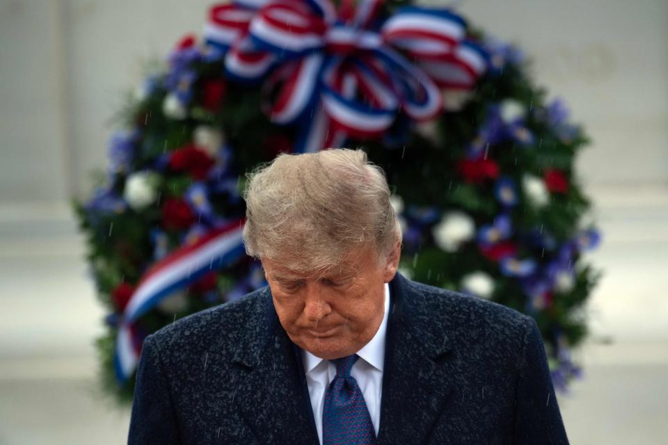 President Donald Trump leaves after placing a wreath at the Tomb of the Unknown Soldier on Veterans Day 2020 at Arlington National Cemetery in Arlington, Virginia.