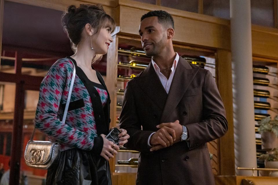 Emily in Paris. (L to R) Lily Collins as Emily, Lucien Laviscount as Alfie in episode 310 of Emily in Paris.