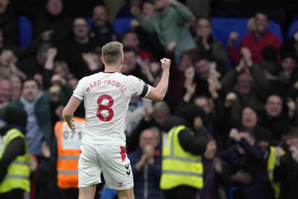 Southampton's James Ward-Prowse celebrates after scoring his side's opening goal during the English Premier League soccer match between Chelsea and Southampton at the Stamford Bridge stadium in London, Saturday, Feb. 18, 2023. (AP Photo/Kirsty Wigglesworth)