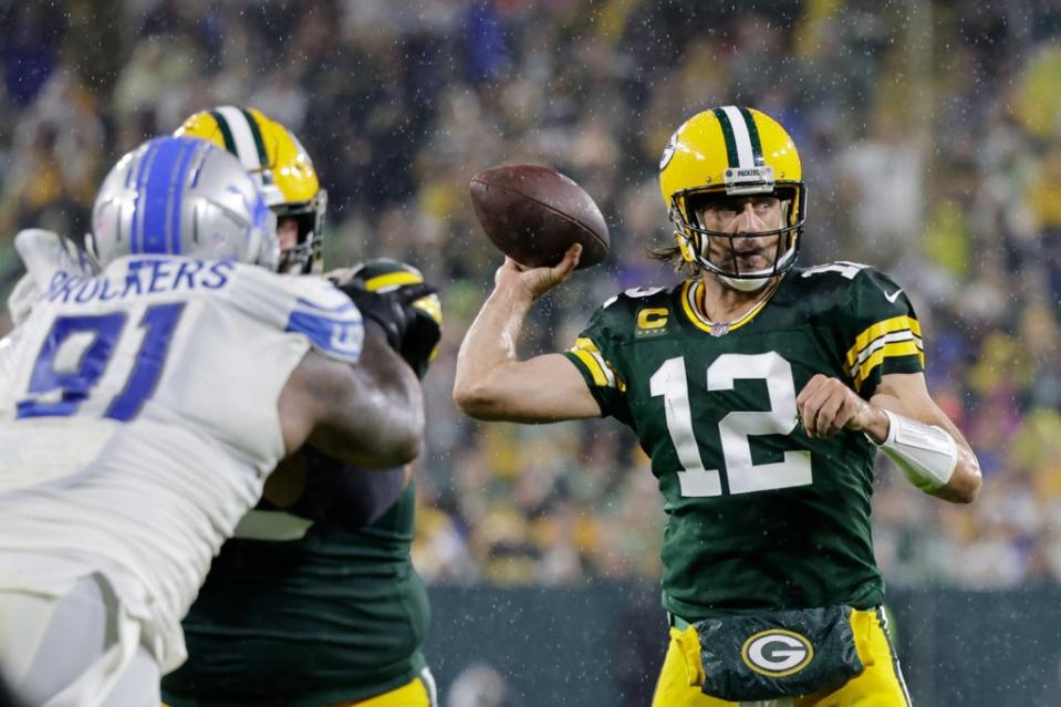 Aaron Rodgers bounced back from a torrid first game of the season to throw four touchdowns in a 35-17 win for the Green Bay Packers over the Detroit Lions (Mike Roemer/AP) (AP)