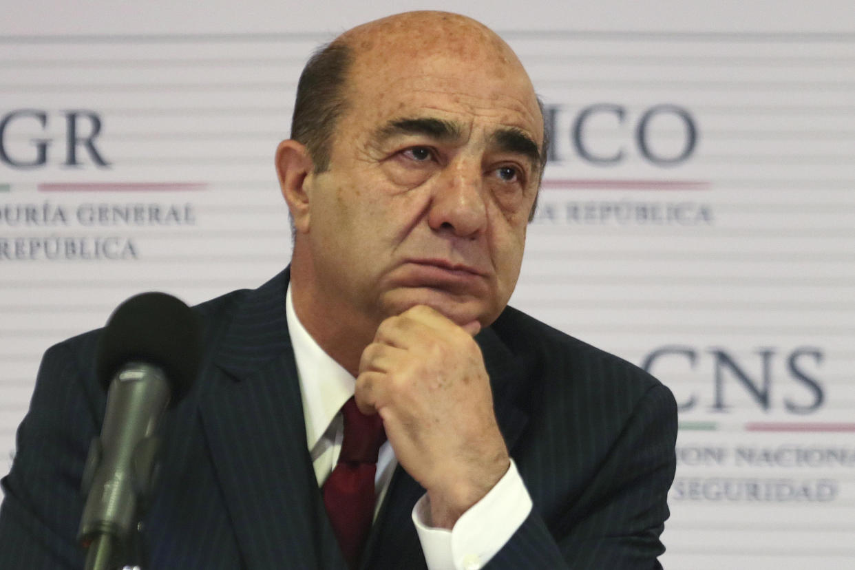 Mexico's Attorney General Jesus Murillo Karam listens to a question during a news conference in Mexico City November 7, 2014. Mexico's government said on Friday evidence suggests that 43 missing trainee teachers were murdered and their charred remains tipped in a rubbish dump and a river in southwest Mexico, citing the confessions of three detained gang members. Murillo said the detainees, caught a week ago, admitted setting fire to members of the group in a rubbish dump near Iguala in the state of Guerrero, where the students went missing on September 26 after clashing with police. REUTERS/Tomas Bravo (MEXICO - Tags: CIVIL UNREST CRIME LAW POLITICS SOCIETY)