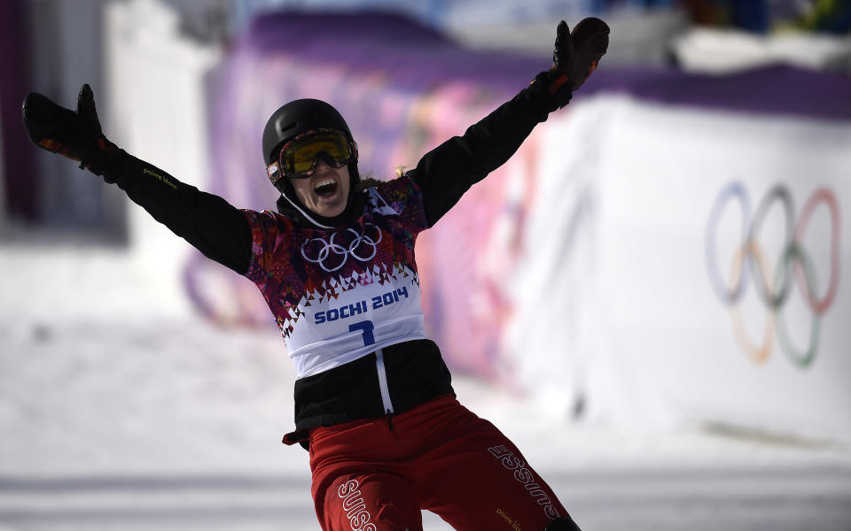 Gold Medallist, Switzerland's Patrizia Kummer celebrates in the Women's Snowboard Parallel Giant Slalom Final at the Rosa Khutor Extreme Park during the Sochi Winter Olympics on February 19, 2014.    AFP PHOTO / FRANCK FIFE        (Photo credit should read FRANCK FIFE/AFP/Getty Images)