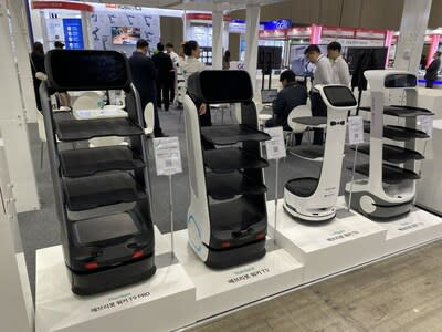 (From left to right) DINERBOT T9 Pro, T9, T8 and T6 displayed at the booth