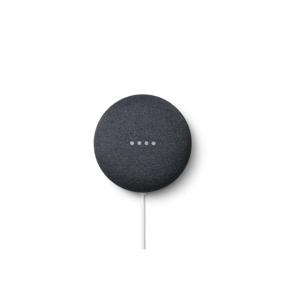 Google Nest Mini against white background