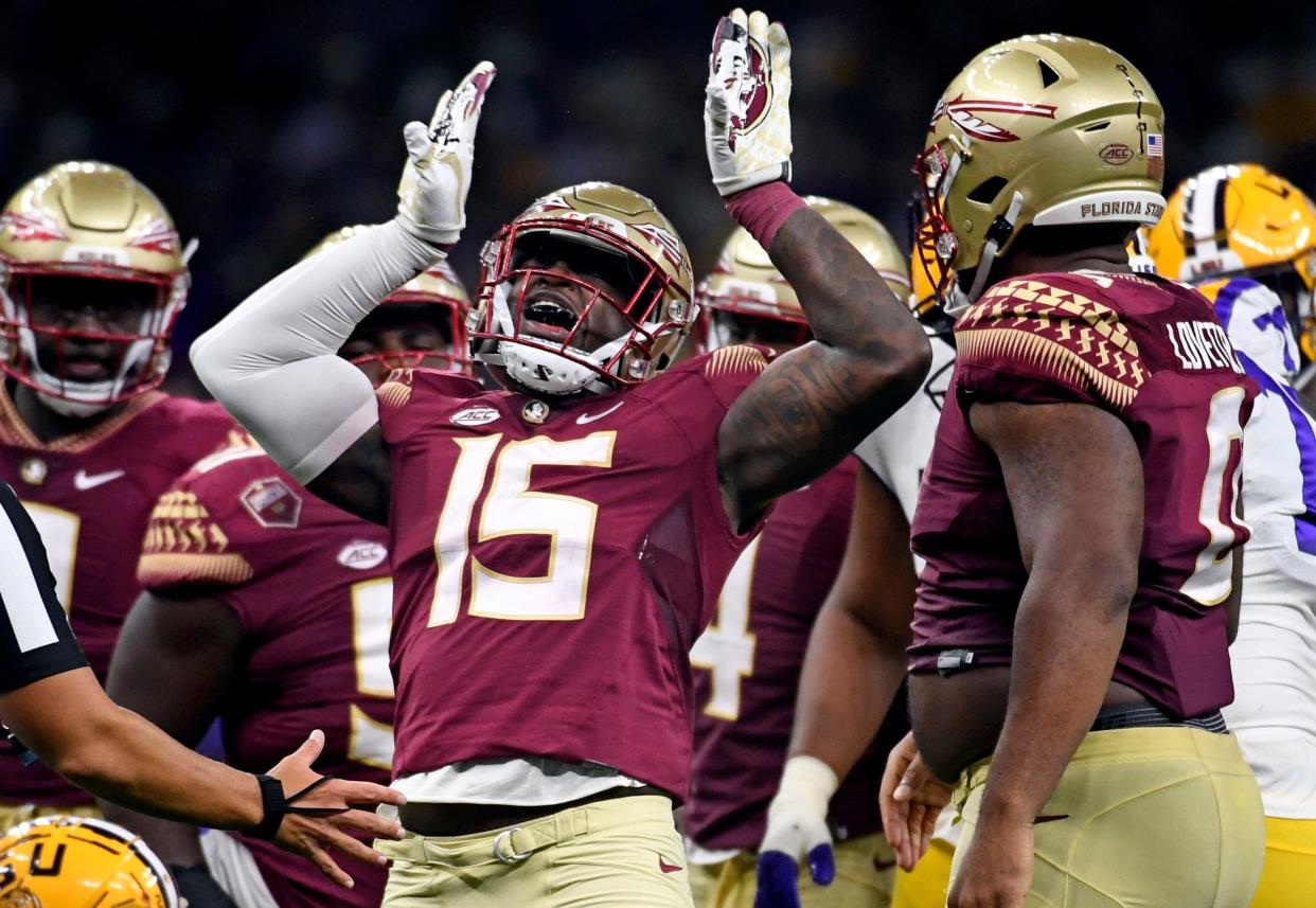 Sep 4, 2022; New Orleans, Louisiana, USA; Florida State Seminoles linebacker Tatum Bethune (15) celebrates a sack during the second half against the Louisiana State Tigers at Caesars Superdome. Mandatory Credit: Melina Myers-USA TODAY Sports