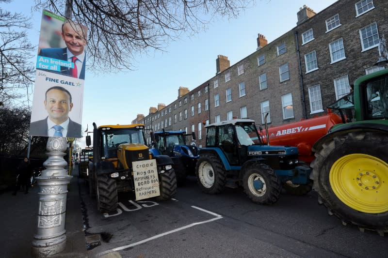 Election posters are seen during farmers' protest near Government Buildings in Dublin