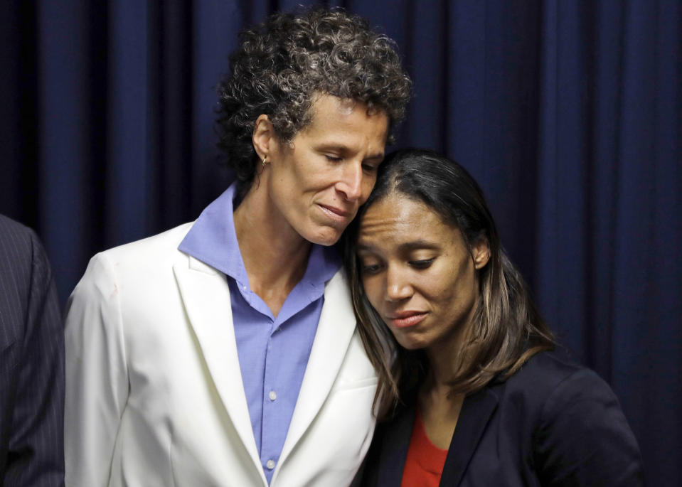 Bill Cosby accuser Andrea Constand, left, embraces prosecutor Kristen Feden