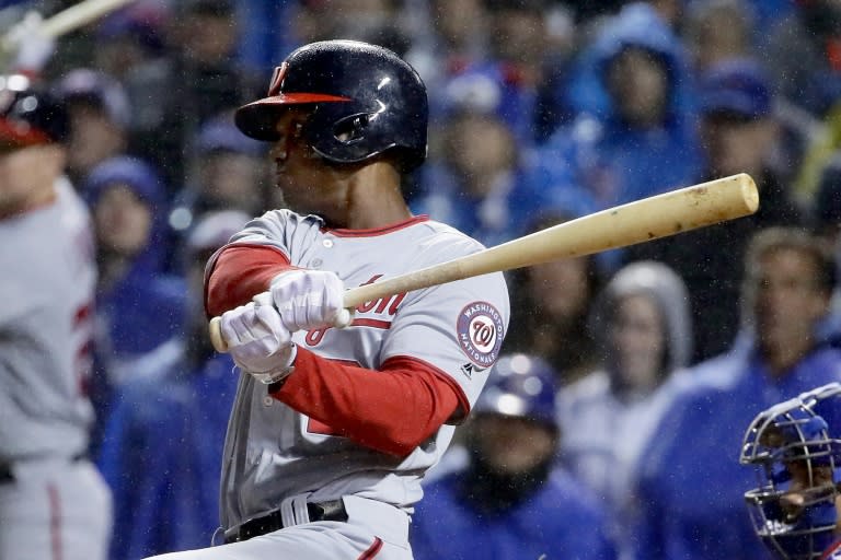 Michael A. Taylor of the Washington Nationals hits a grand slam in the eighth inning during game four of the National League Division Series against the Chicago Cubs, at Wrigley Field in Chicago, Illinois, on October 11, 2017