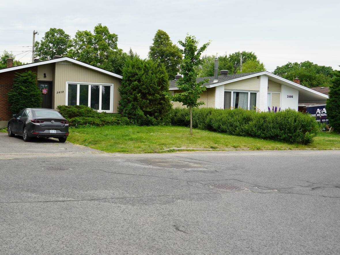 A Miller Waste Systems garbage truck struck a 70-year-old woman at the intersection of Joliffe Street and Tupper Avenue on Monday. She was taken to hospital in critical condition, where she later died. (Jean Delisle/CBC - image credit)