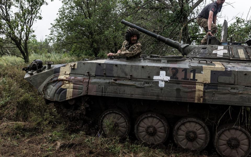 Ukrainian soldiers of the 57th brigade are seen with a BMP during the tactical training as Russian-Ukrainian war continues in Donetsk Oblast, Ukraine on July 09, 2023