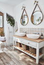 <p> No matter what size your space, bathroom storage ideas are always important. Try to have a mix of open and closed storage in your bathroom so there are spaces for your best toiletries, houseplants, and pretty knick-knacks to be on show, but also doors for unsightly but essential bits to hide behind. </p> <p> This bathroom ticks all the boxes with a mix of baskets (always a winner), drawers, a ladder for towels, and some little open shelves too. Lots of bathroom ideas to copy here &#x2013; those tiles are lush too! </p>