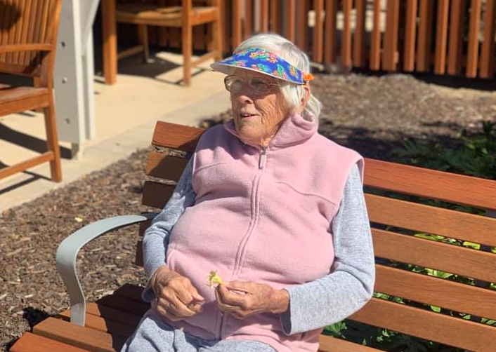 Pictured is Val Hopper. Her grandson is encouraging others to take their pets to visit their relatives with dementia after seeing the joy it brings to his grandmother.