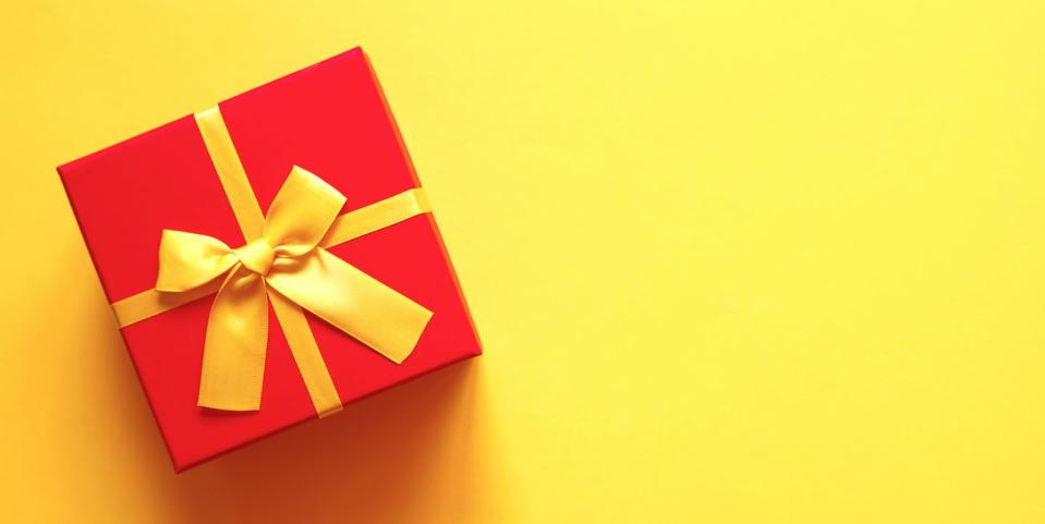 red gift box on yellow background