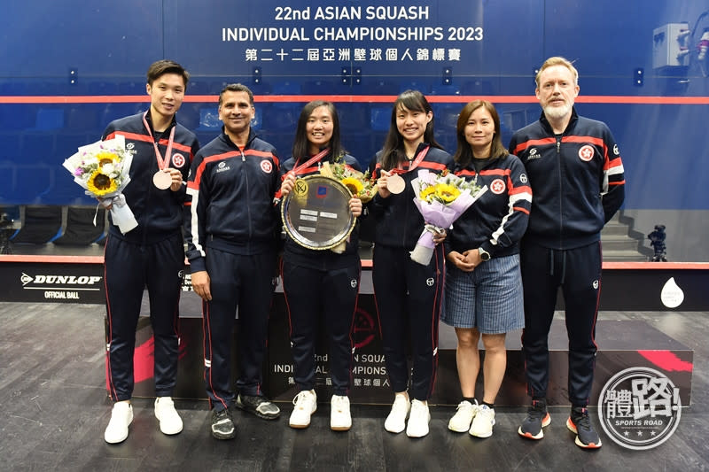 Hong Kong team head coach Cheng Peide (first from the right)