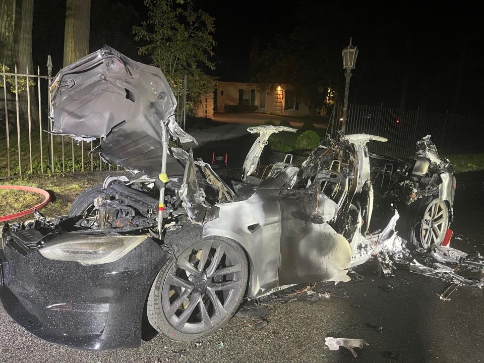 A charred Tesla Model S Plaid.