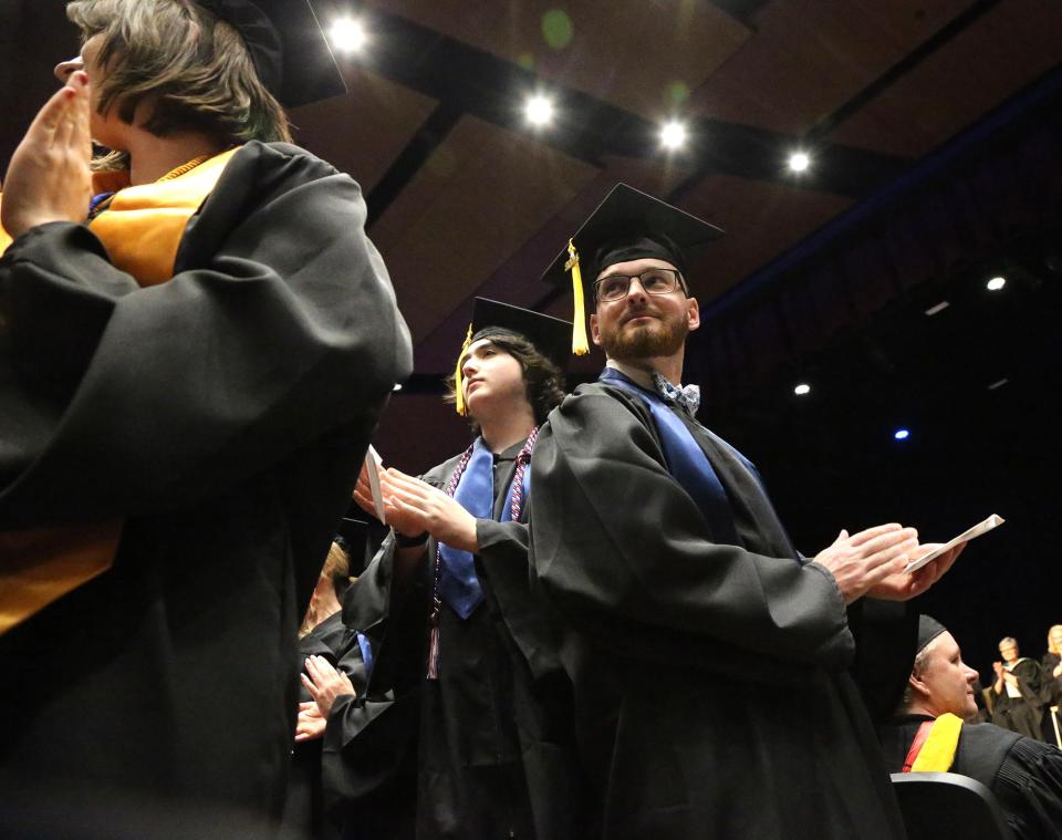 York County Community College’s Class of 2024 scans the crowd for the familiar faces of loved ones after receiving their degree May 17, 2024.