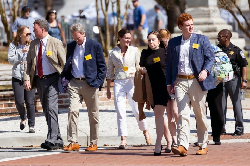 From left, Randy Murdaugh; John Marvin Murdaugh; his wife, Liz Murdaugh; Brooklynn White; and Buster Murdaugh, the son of Alex Murdaugh, leave the courthouse during Alex Murdaugh’s trial (AP)