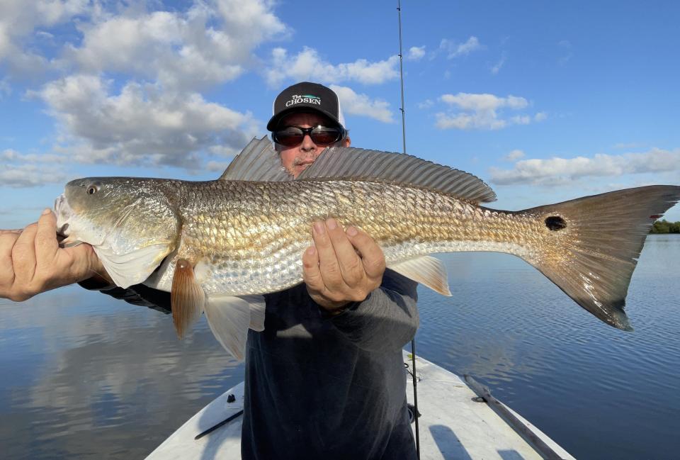 Craig Patterson left his post at Donald's Bait Shop and hooked up with this big red in the intracoastal.