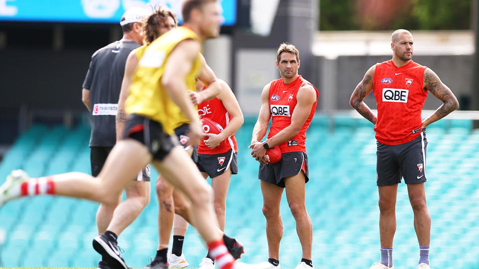 Lance Franklin, pictured here watching the Sydney Swans training session.