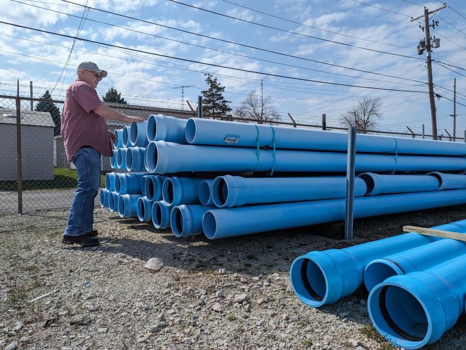 Fremont Water and Sewer Maintenance Department Supervisor Bob Ward Jr. shows regularly used 8-inch C900 PVC pipe that has increased from $8.11 per foot to $22.40 per foot.