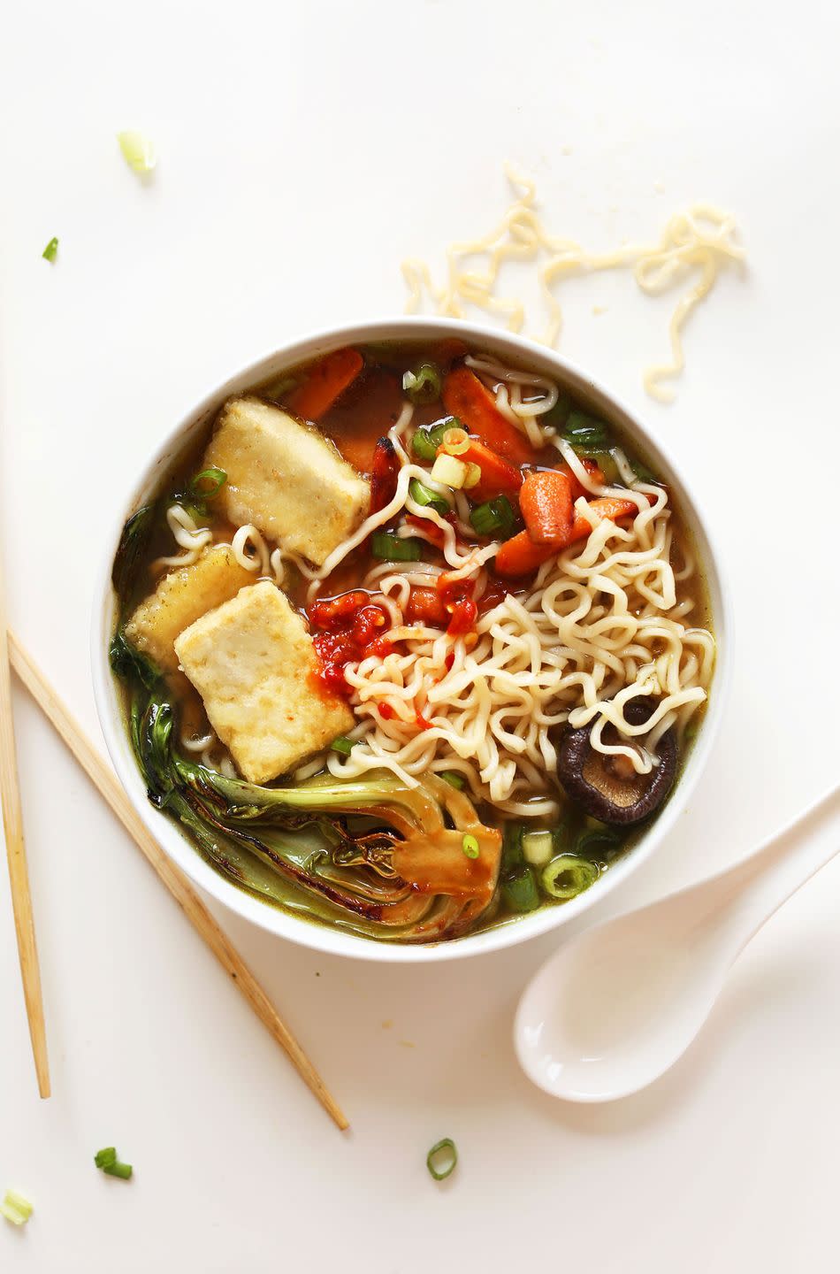 <p>This meal-in-a-bowl, made of homemade mushroom broth, crispy tofu, and miso-roasted veggies, beats greasy takeout (almost) any day.</p><p><a class="link " href="https://minimalistbaker.com/easy-vegan-ramen/" rel="nofollow noopener" target="_blank" data-ylk="slk:GET THE RECIPE;elm:context_link;itc:0;sec:content-canvas">GET THE RECIPE</a></p><p><em>Per </em><em>serving</em><em>: 340 calories, 14 g fat (5 g saturated), 42 g carbs, 3 g sugar, 1,903 mg sodium, 4 g fiber, 9 g protein</em></p>